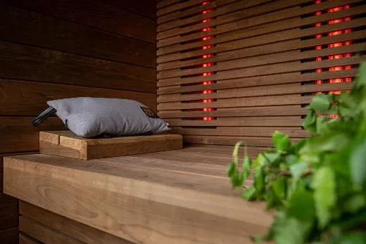 Infrared heaters hidden behind custom paneling – Kirami FinVision® -sauna M Misty | Outdoor sauna